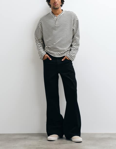ASOS DESIGN wide flared jeans in black - view 1