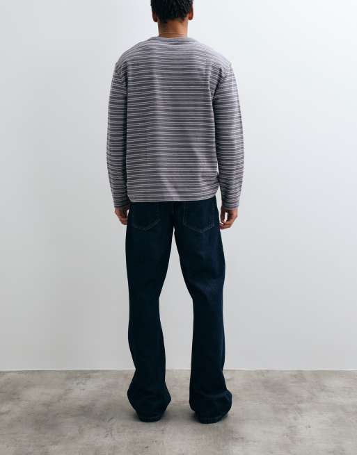 ASOS DESIGN wide flared jeans in dark washed blue, 3 of 5