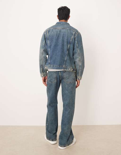 ASOS DESIGN wide flared jeans in mid wash blue with yellow tint - part of a set