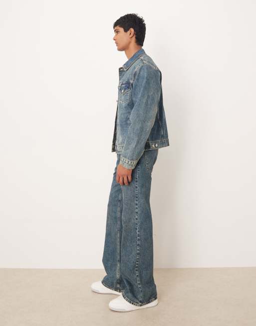 ASOS DESIGN wide flared jeans in mid wash blue with yellow tint - part of a set