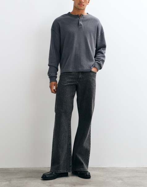ASOS DESIGN wide flared jeans in washed black - view 1