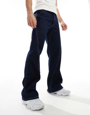 wide flared jeans with contrast stitching in rinse wash blue