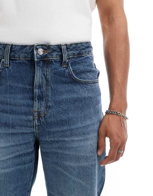 ASOS DESIGN wide hem baggy jeans in mid wash blue, 4 of 5