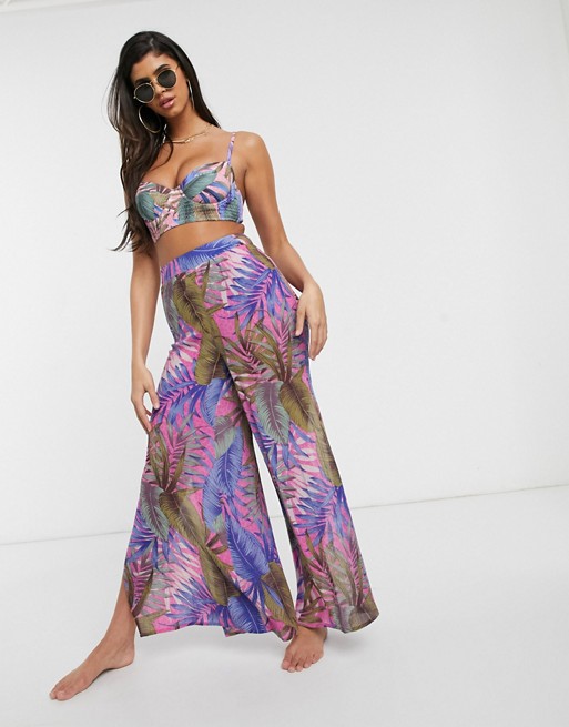 ASOS DESIGN wide leg beach trouser with side splits in crinkle tropical lilac palm print