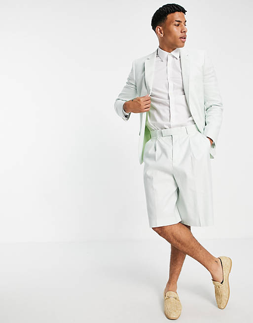 ASOS DESIGN wide leg bermuda shorts in pastel green cotton linen