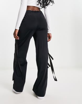 ASOS DESIGN wide leg cargo pants with strapping detail in black