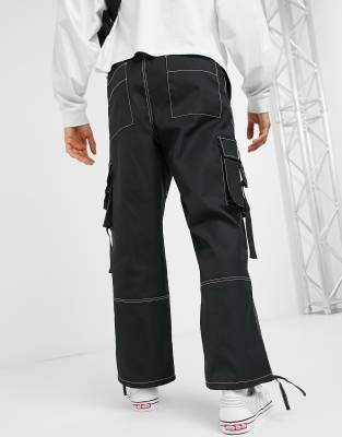 black cargo trousers with white stitching