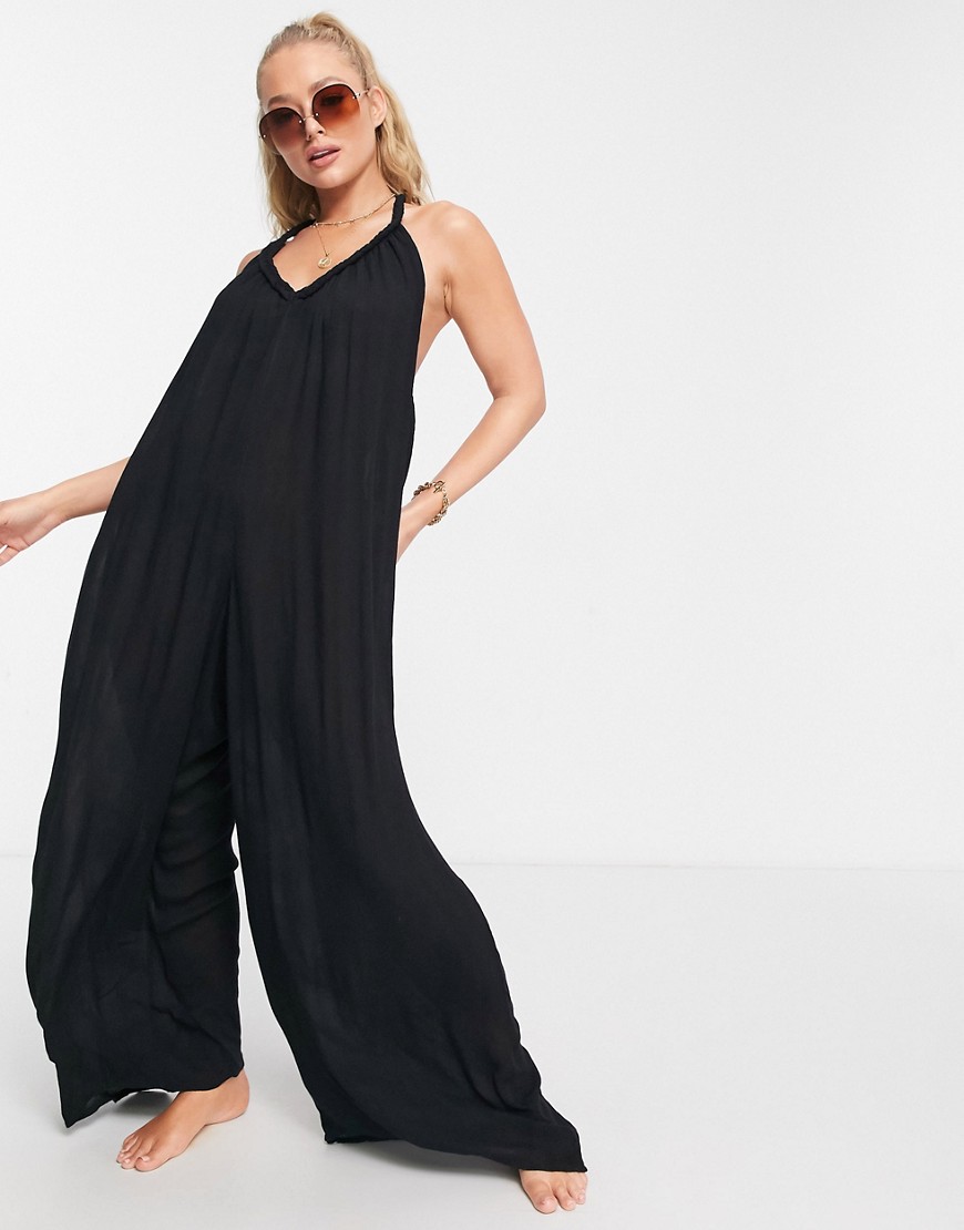 ASOS DESIGN wide leg crinkle beach jumpsuit with plait detail in black