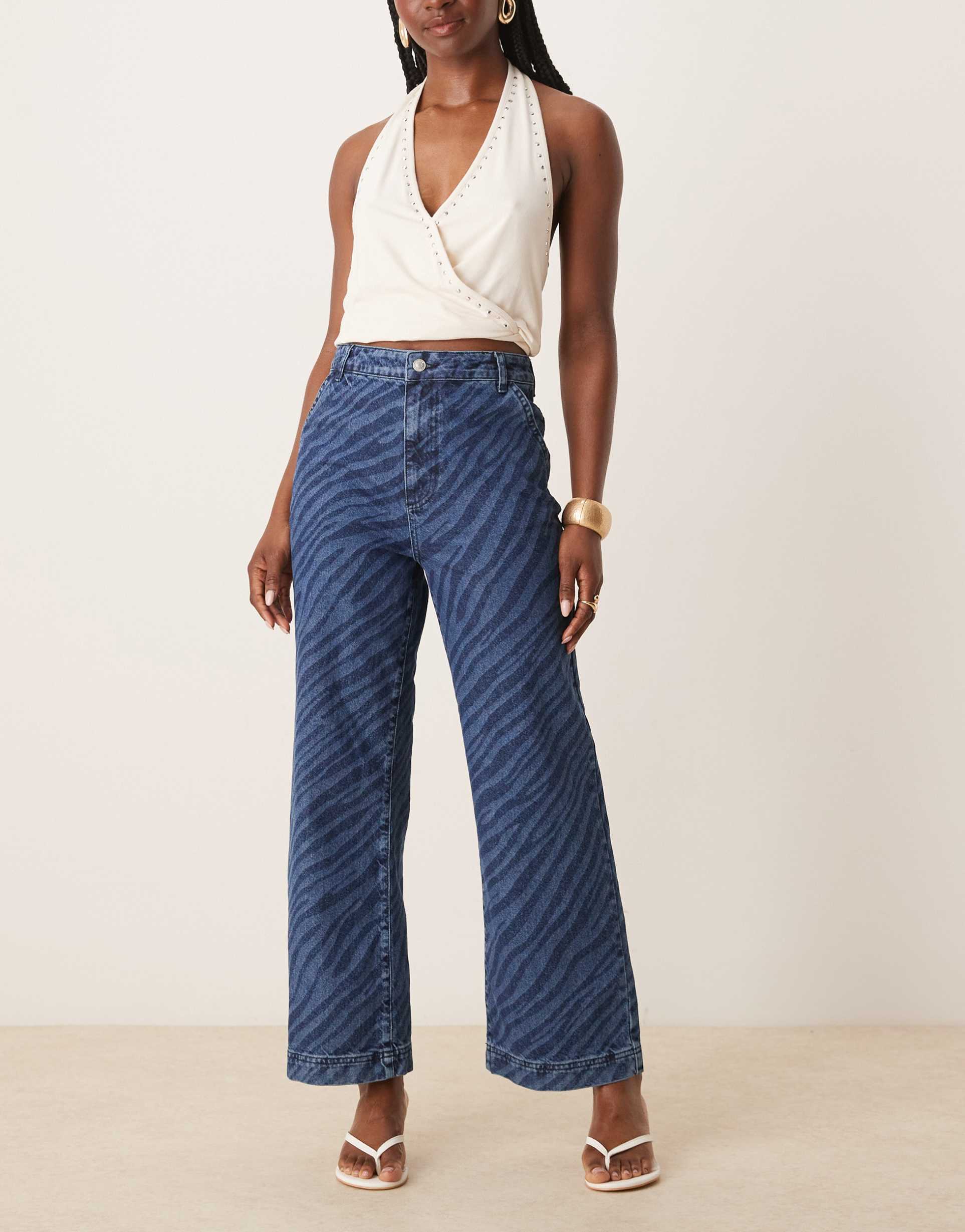 asos design wide leg cropped jeans with zebra laser in mid blue