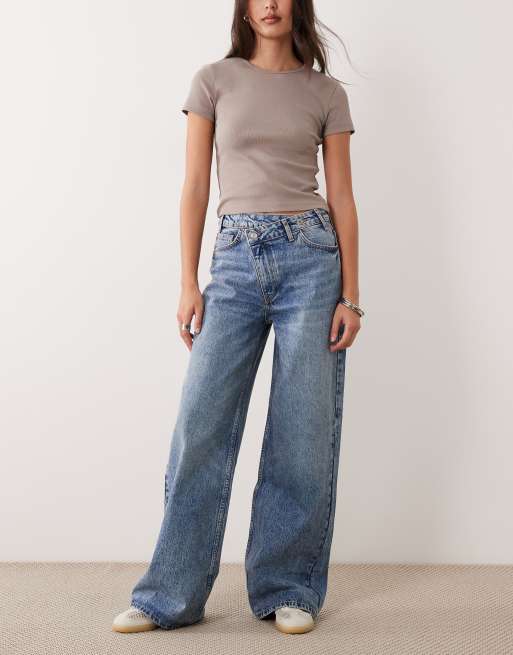 ASOS DESIGN wide leg dad jean with crossover waist in midwash