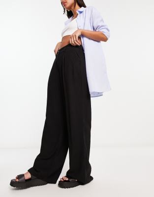 ASOS DESIGN wide leg dad trousers with linen in black