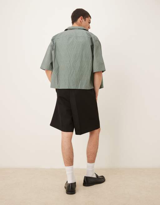 ASOS DESIGN wide leg dressy shorts with front pleats in black