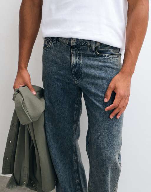 ASOS DESIGN wide leg flare jeans in vintage wash blue, 2 of 5