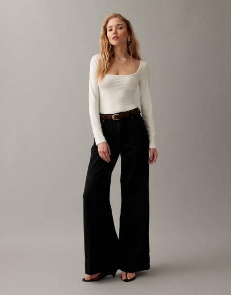 ASOS DESIGN wide leg jean with crease front and belt in black