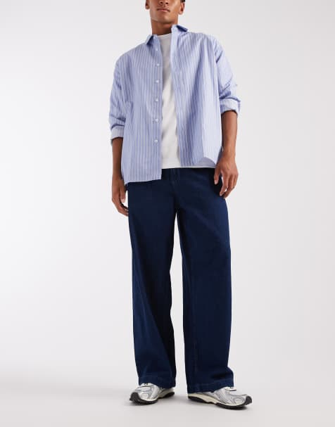 ASOS DESIGN wide leg jeans in darkwash blue with pleats - view 1