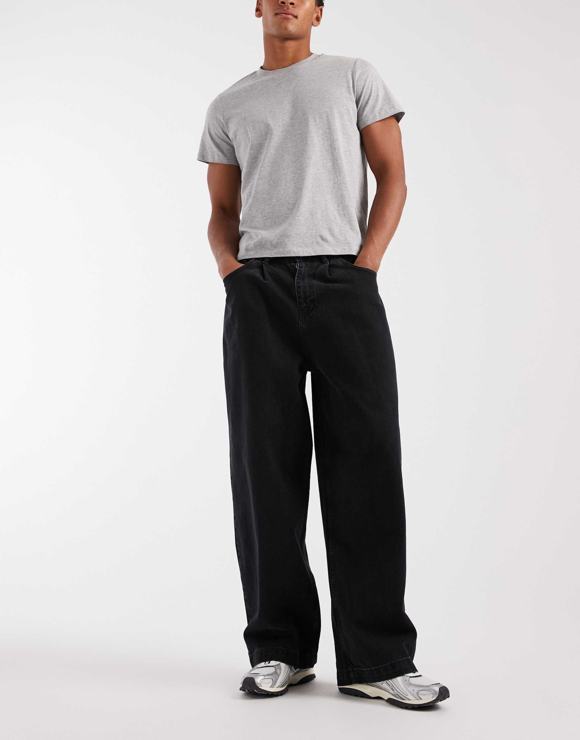 ASOS DESIGN wide leg jeans in washed black with pleats
