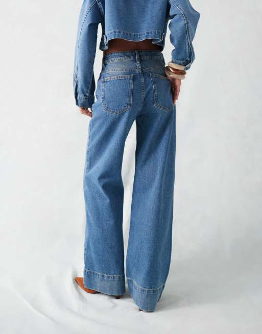 ASOS DESIGN wide leg jeans with deep hem in mid blue | ASOS