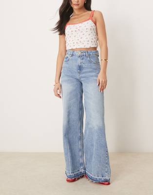 wide leg jeans with let down hem in pale wash-Blue