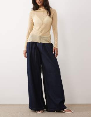 ASOS DESIGN wide leg jeans with pleat detail in rinse wash