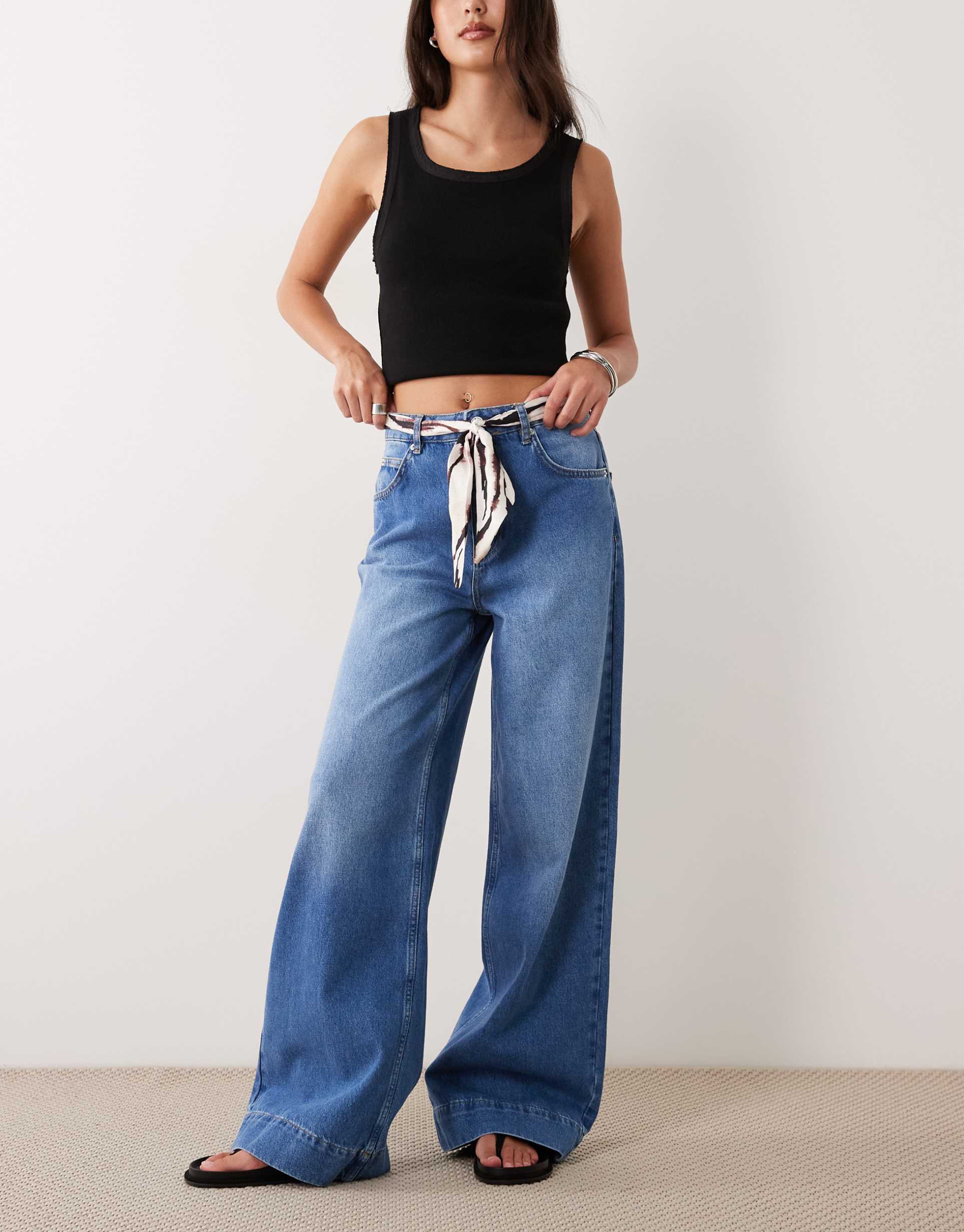 asos design wide leg jeans with zebra scarf belt in mid wash