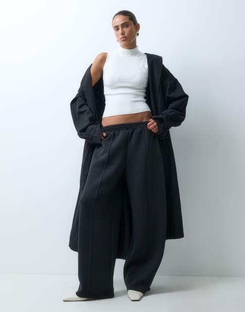 'ASOS DESIGN wide leg jogger in scuba-style fabric with pleat detail in black - view 1