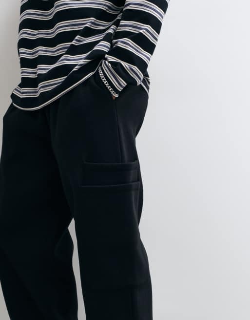 ASOS DESIGN Wide leg jogger with layered cargo pockets in washed black poly cotton, 2 of 5