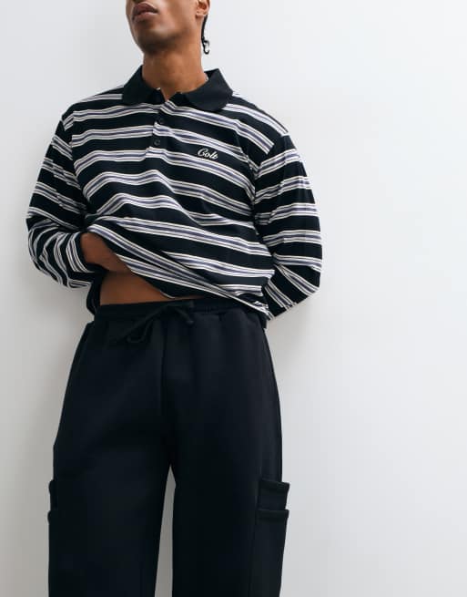 ASOS DESIGN Wide leg jogger with layered cargo pockets in washed black poly cotton, 4 of 5