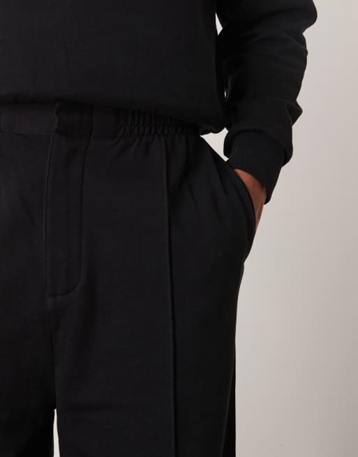 ASOS DESIGN wide leg jogger with pin tucks and zip fastening in black, 3 of 5
