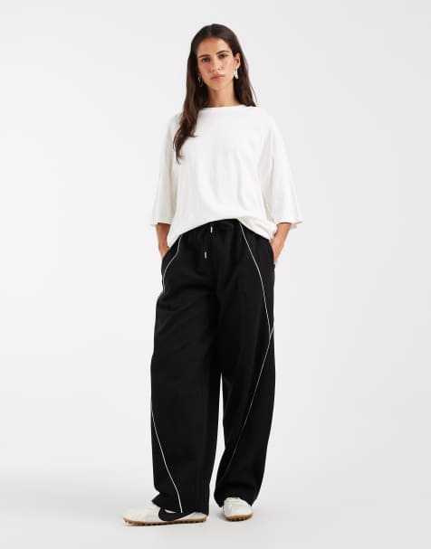 ASOS DESIGN Wide leg jogger with piping detail in black - view 1