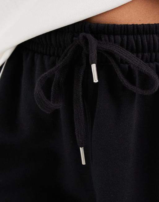 ASOS DESIGN Wide leg jogger with piping detail in black, 4 of 5