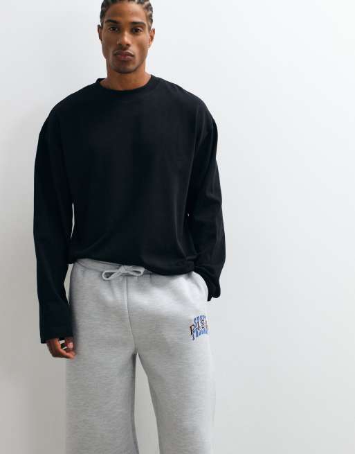 ASOS DESIGN wide leg jogger with print in scuba-style fabric in grey marl, 2 of 5
