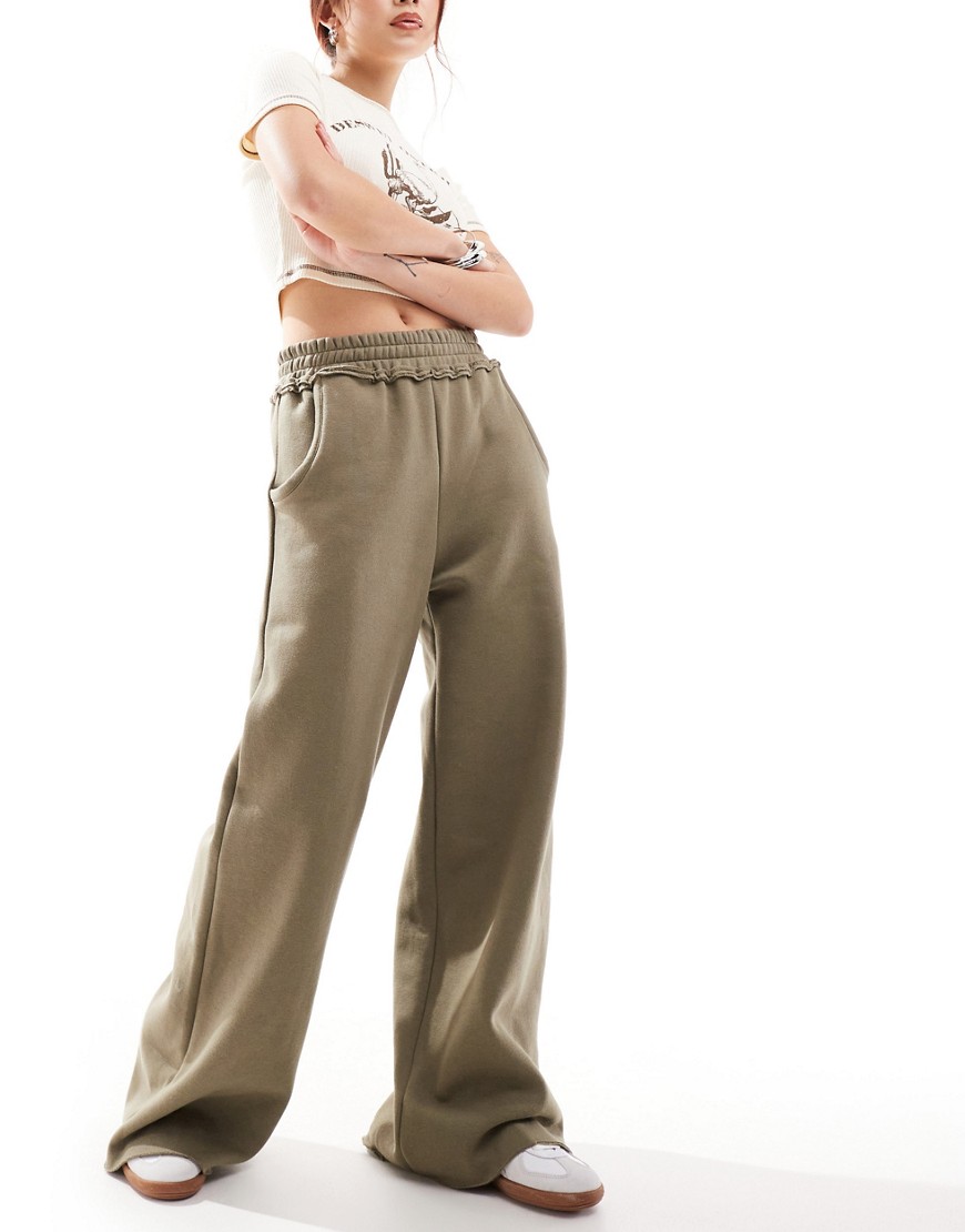 ASOS DESIGN wide leg jogger with raw edge waistband in khaki-Green