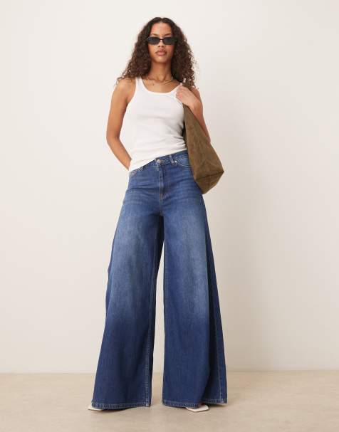 ASOS DESIGN wide leg palazzo jeans in mid blue - view 1