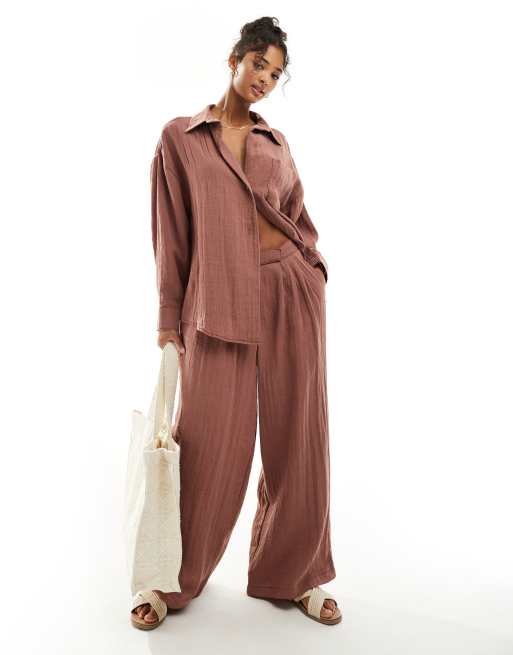 ASOS DESIGN wide leg pants with pleat detail in textured fabric in rust - part of a set