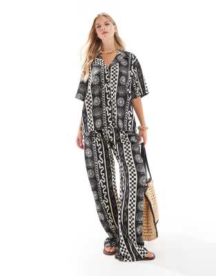 Asos Design Wide Leg Pants With Shell Vacation Print In Mono - Part Of A Set-multi
