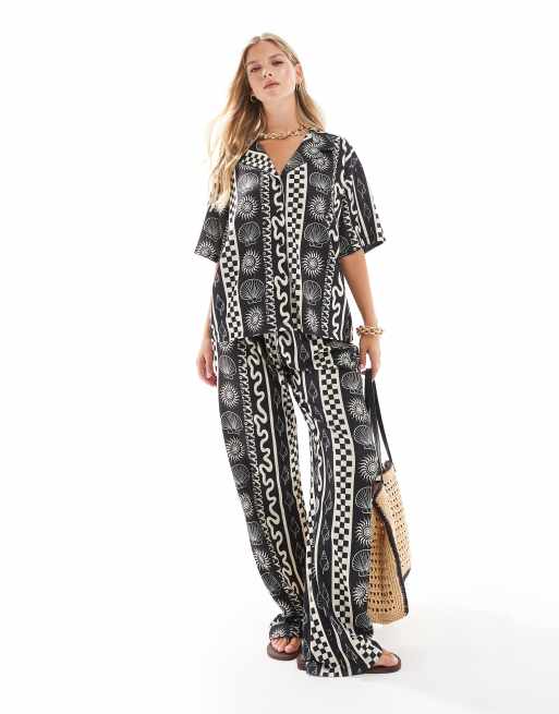 ASOS DESIGN wide leg pants with shell vacation print in mono - part of a set