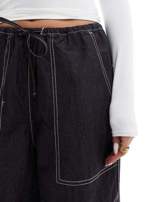 ASOS DESIGN wide leg pants with tie hem and pocket detail in navy crinkle, 5 of 5