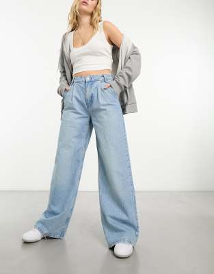 Asos Design Wide Leg Pleat Front Jean In Mid Blue