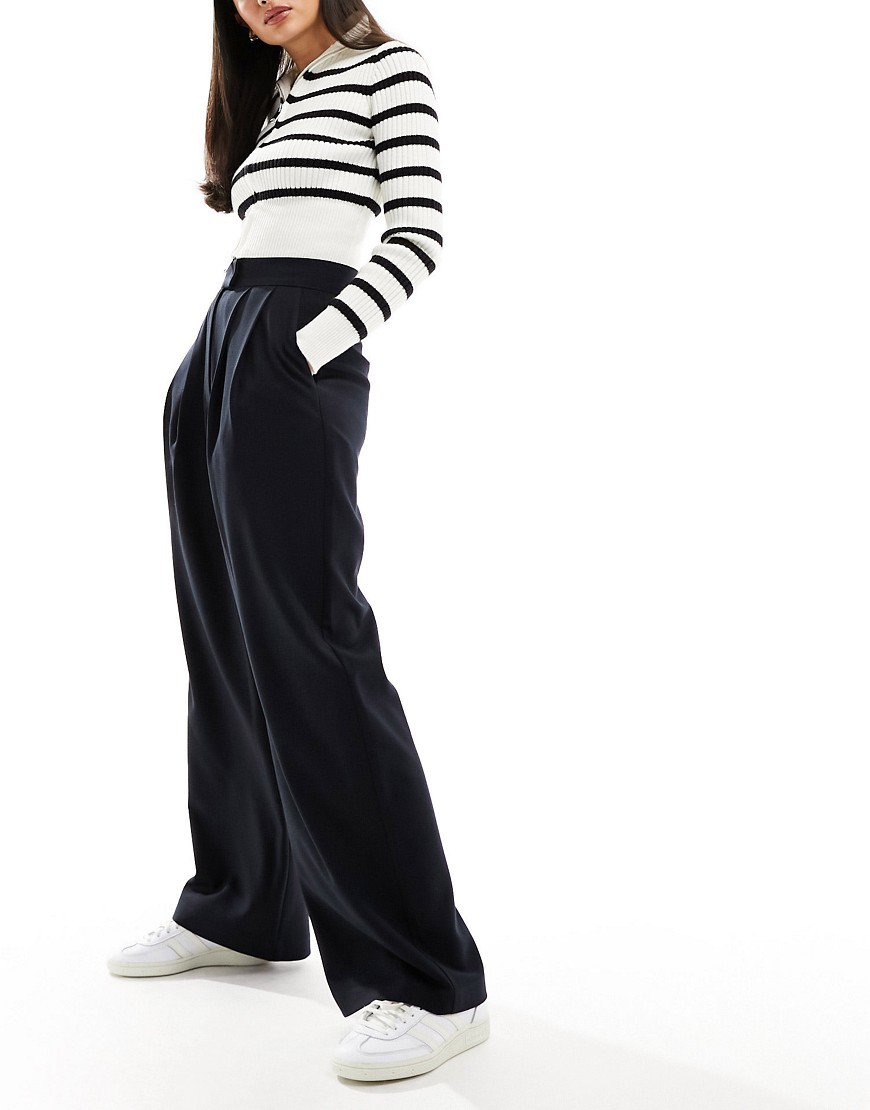 ASOS DESIGN wide leg pleated trousers in navy