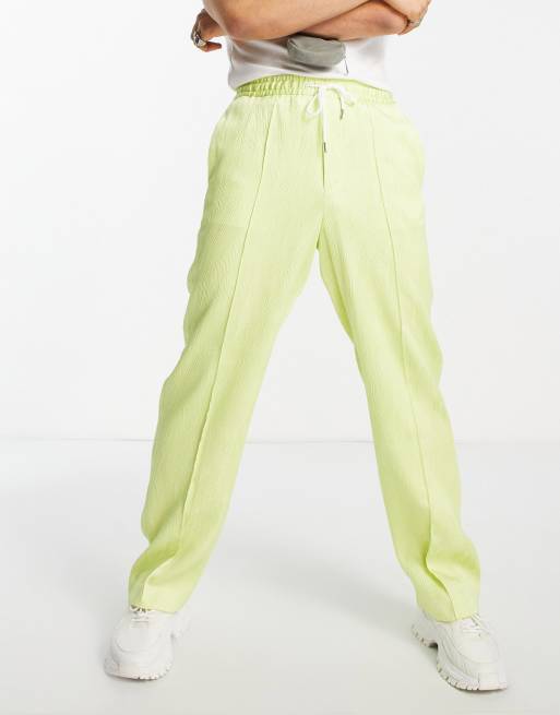ASOS DESIGN wide leg plisse pants with rubber drawstring in citrus yellow 
