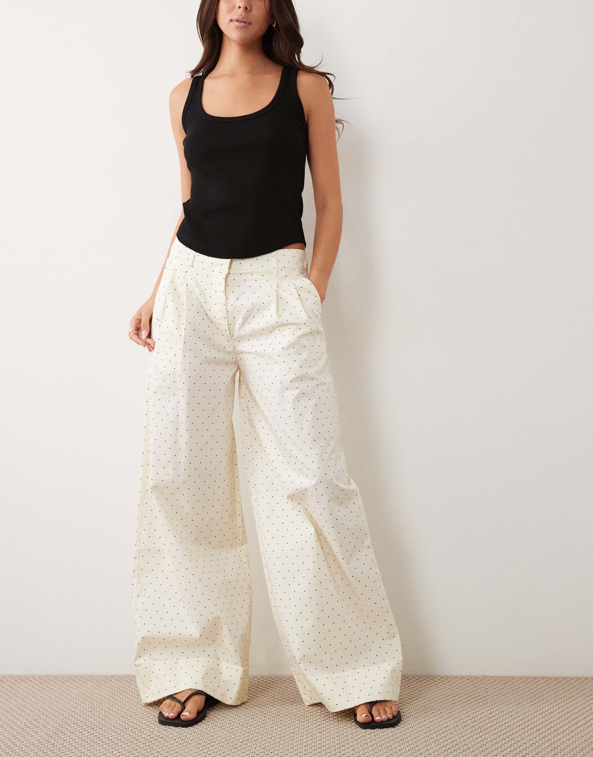 asos design wide leg polka dot pants with cuffed hem in butter yellow