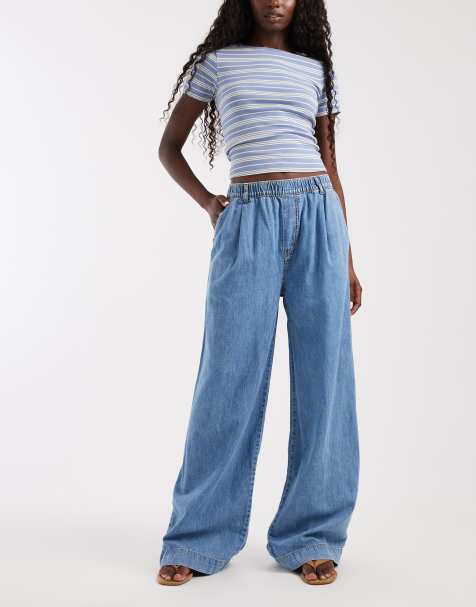 ASOS DESIGN wide leg pull on jean in midwash blue