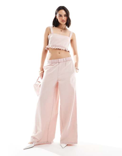 ASOS DESIGN wide leg pull on pants with button detail in washed pink