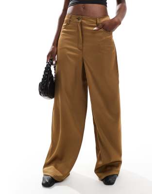 wide leg satin pants with contrast stitching in gold