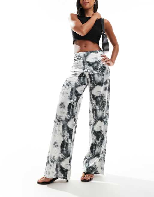 ASOS DESIGN wide leg satin twill pants in distorted animal print