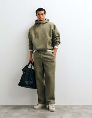 Asos Design Wide Leg Scuba-style Fabric Jogger With Embroidery In Green