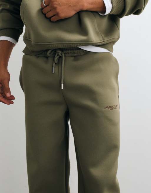 ASOS DESIGN wide leg scuba-style fabric trackies with embroidery in olive green, 2 of 5