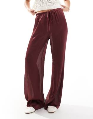 ASOS DESIGN wide leg semi sheer plisse trouser in burgundy-Red