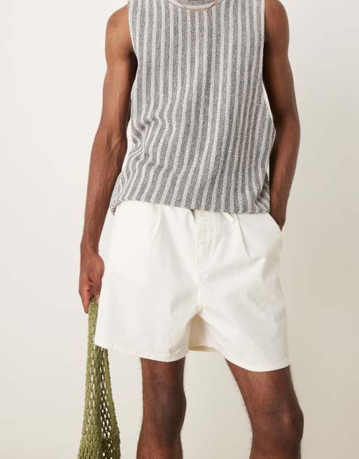 ASOS DESIGN wide shorter length pleated shorts with drawstring in white