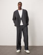 ASOS DESIGN wide leg suit pants in black textured fabric | ASOS